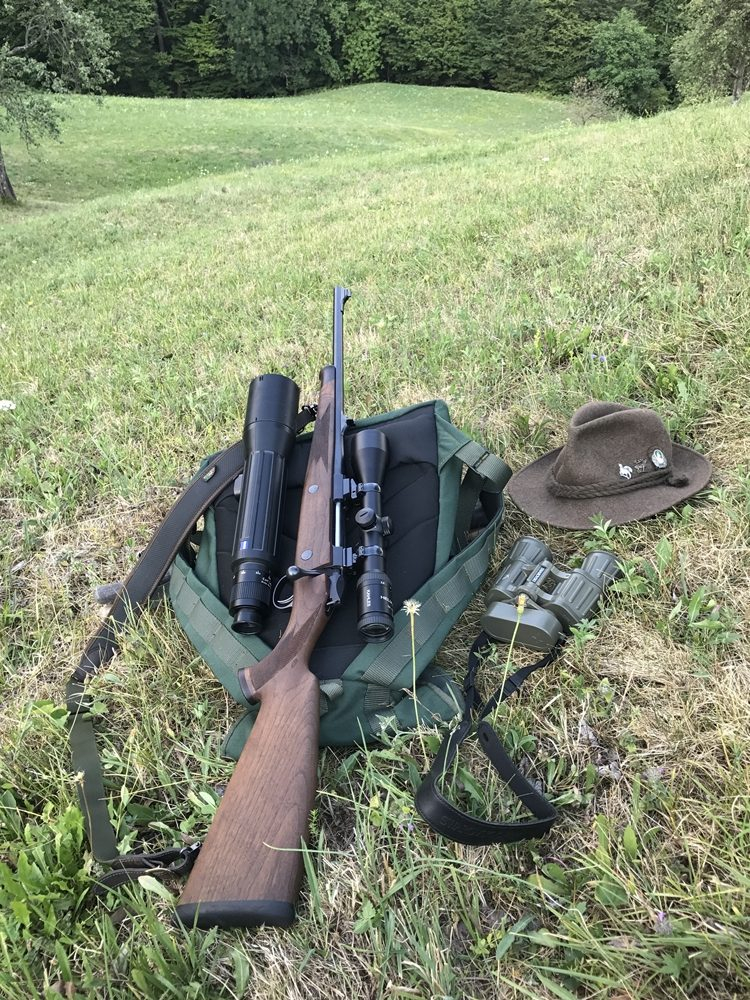 A rifle with optics -  hunting riflescope